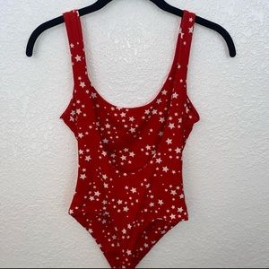 Soft thick material body suit with open back